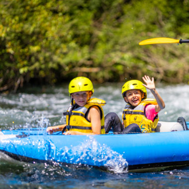Children during their fun-filled river kayaking adventure